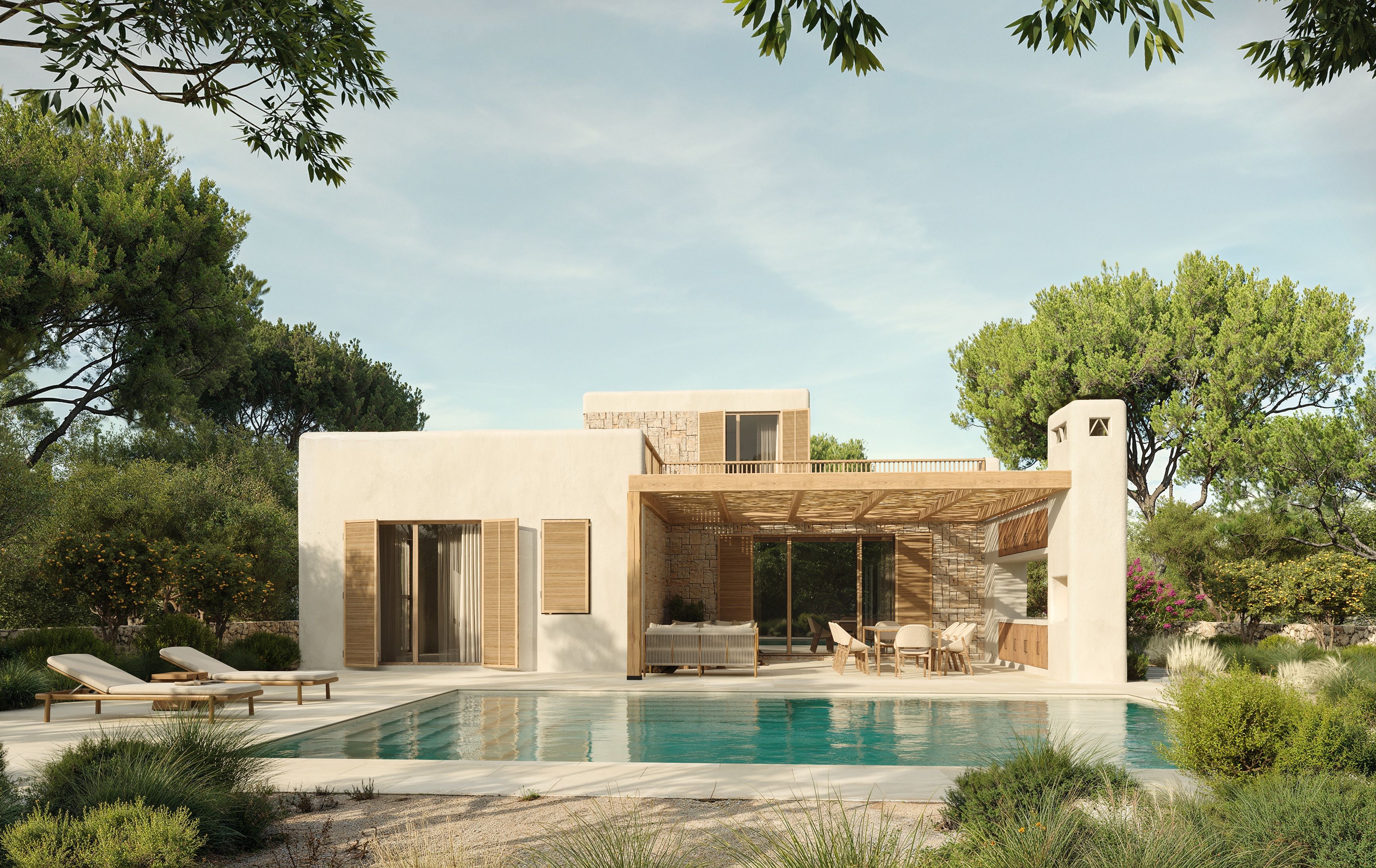 Mediterranean villa in Ametlla de Mar seen from the pool, with its main façade rising among the pines