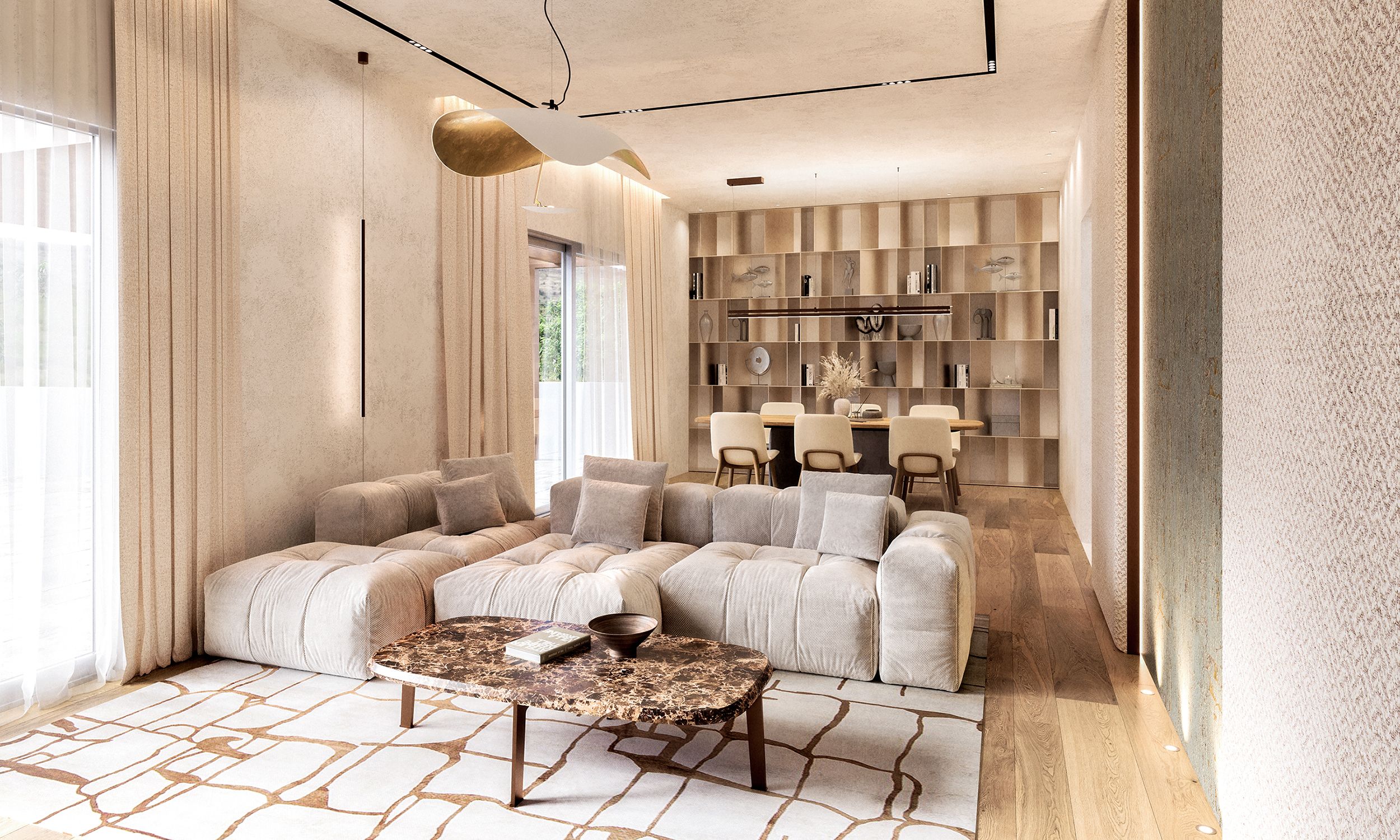 Renovated penthouse interior in a neoclassical Barcelona building with warm tones and bronze accents