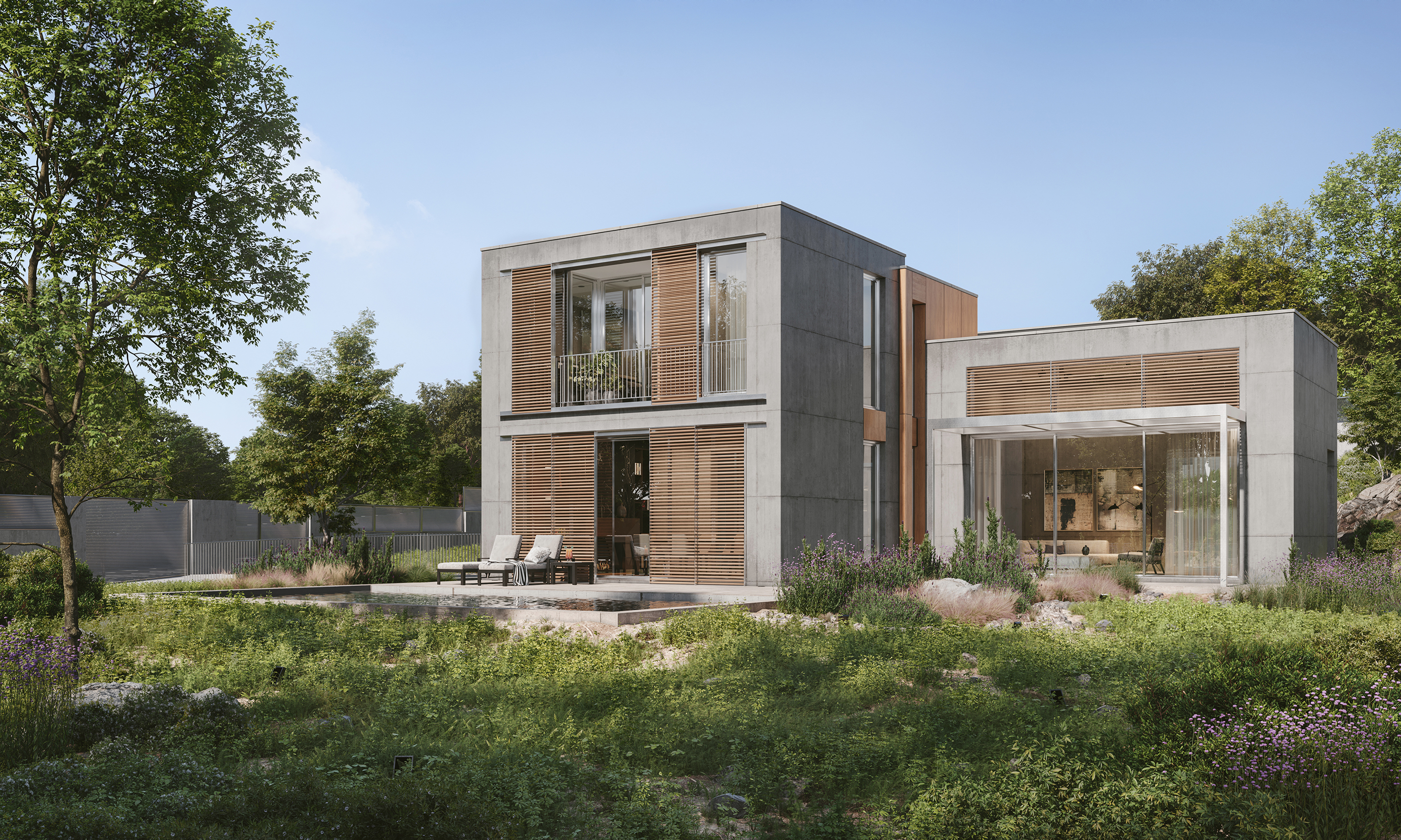 Interior courtyard enclosed by concrete volumes and the polished granite rock
